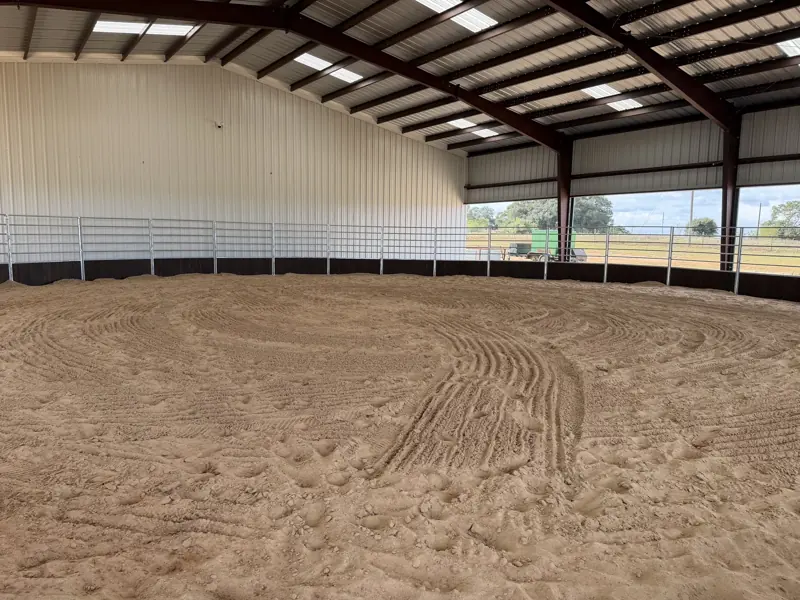 70 foot covered and lighted round pen with sand footing
